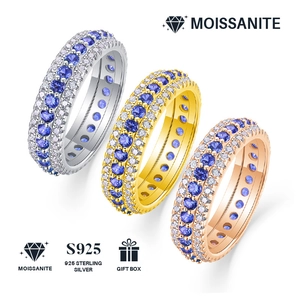 Close-up of three S925 sterling silver moissanite rings in silver gold and rose gold