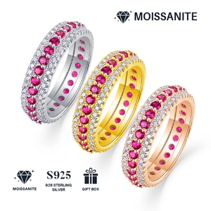 Three rows of S925 sterling silver rings with red moissanite stones and a gift box