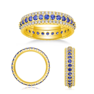 Detailed views of gold eternity ring with three rows of blue and white gemstones