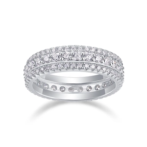 Macro detail of S925 sterling silver ring with three rows of sparkling white gemstones