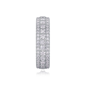 Macro shot of silver S925 eternity ring with triple-row micro-pave sparkling gemstones