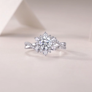 Macro shot of S925 silver ring featuring a halo of diamonds and a stylish twisted band