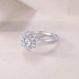 Detailed close-up showing the S925 silver hallmark and cluster setting of the engagement ring