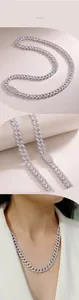 Detailed view of S925 silver Cuban link necklace with sparkling moissanite pave setting