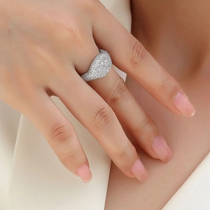 Macro detail of S925 sterling silver ring with full moissanite micro-pave setting on model