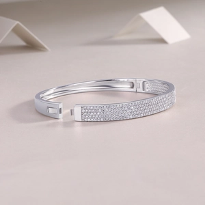 Polished S925 sterling silver bangle with full pavé moissanite stones and secure buckle