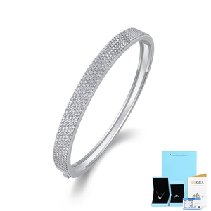 Detailed view of moissanite silver bangle with luxury gift packaging and GRA certificate
