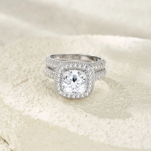 Luxurious S925 sterling silver ring set with cushion-cut moissanite and micro-pave diamonds