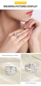 Vue détaillée d'une bague en argent avec moissanite poire sur mannequin et pierre naturelle