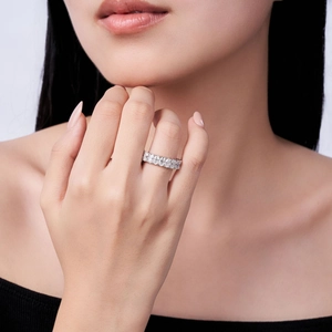 Eternity ring in S925 sterling silver featuring oval cut moissanite stones set in 18K white gold