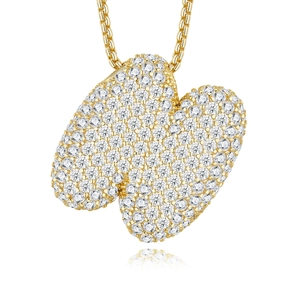 Close-up of golden heart pendant necklace with shimmering round-cut white gemstones