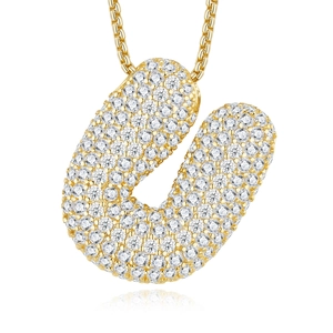 Close-up of a luxury gold S925 silver necklace with sparkling letter U moissanite pendant