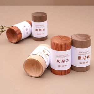 Cylindrical wood essential oil diffusers in walnut, rosewood, and beech wood materials