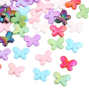 Detailed view of colorful acrylic butterfly beads with iridescent mother-of-pearl finish