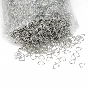 Macro view of triangular iron jump rings for DIY jewelry making and connector crafts