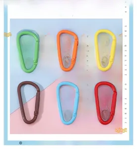 Macro view of colorful D-shaped aluminum alloy carabiners in six vibrant colors