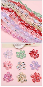 Macro detail of handmade 14x10mm fish-shaped glass beads for DIY jewelry making