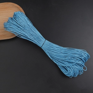 Detail view of 1mm blue waxed cotton cord bundle for DIY jewelry and handmade weaving