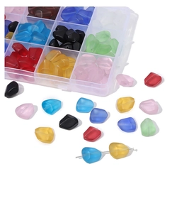 Detailed view of colorful frosted glass beads in a storage box for DIY jewelry making
