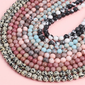 Polished natural stone beads in assorted patterns for DIY jewelry making and bracelets
