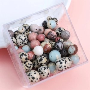 Assorted natural stone beads kit in storage box including dalmatian and pink stones
