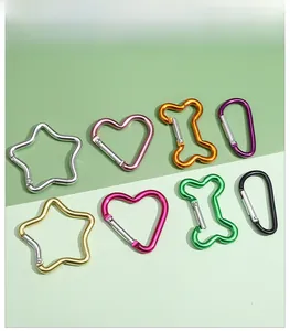 Macro display of colorful aluminum alloy carabiners in star, heart and bone shapes