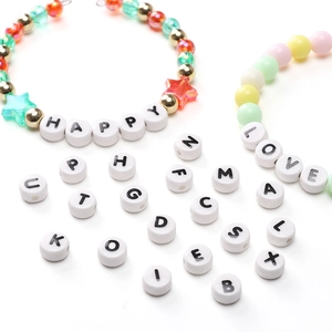 Flat round white ceramic style alphabet beads with black letters for DIY jewelry bracelets