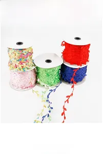 Detail of colorful leaf-shaped polyester ribbon rolls for DIY handmade crafts and decorations
