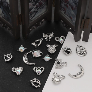 Y2K vintage silver charms set featuring moon, heart and bow designs with gemstones
