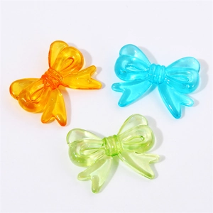 Colorful acrylic twist bow beads in orange blue and green for DIY handmade jewelry