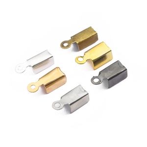 Detail view of U-shaped iron end crimp beads for jewelry making in six metallic finishes