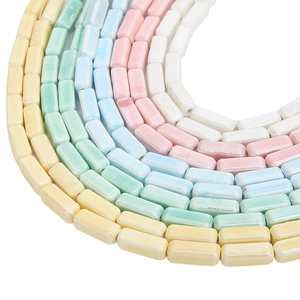 Macro shot of colorful 6x15mm rectangular ceramic tube beads in macaron colors for DIY jewelry