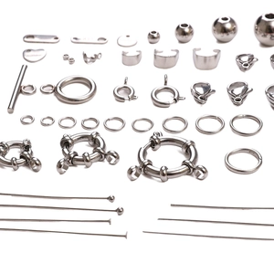 Polished stainless steel jewelry making kit with lobster clasps jump rings and head pins