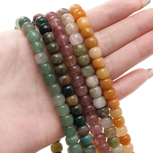Macro detail of multi-colored natural semi-precious stone beads for jewelry DIY
