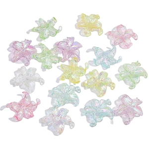 Macro detail of acrylic lily flower beads with iridescent AB coating for DIY jewelry