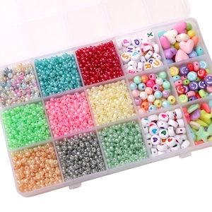DIY jewelry making kit with 15-grid box containing colorful glass seed beads and charms