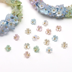 Pastel acrylic lily of the valley flower beads for DIY jewelry and handmade necklace crafting