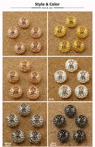 Detailed view of hollow geometric metal beads in gold, silver, rose gold, and black colors