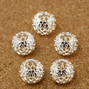 Hollow silver tennis ball beads for DIY jewelry making with geometric cutouts