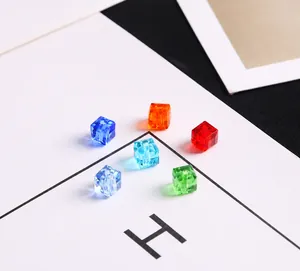 Macro detail of colorful 6mm square crystal glass beads for DIY jewelry making and crafts