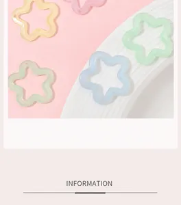 Macro detail of acrylic luminous star charms in macabre pastel colors for DIY jewelry