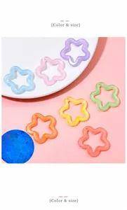 Detailed macro view of colorful macaron acrylic luminous hollow star DIY craft charms
