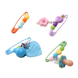 Set of four colorful painted safety pins with assorted DIY beads and cute charms
