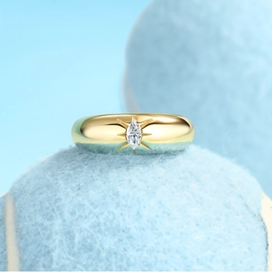 Polished 18K gold S925 silver ring with marquise cut moissanite in starburst setting