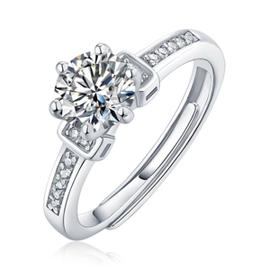 Detail of a six-prong set moissanite ring with side diamonds and adjustable S925 band