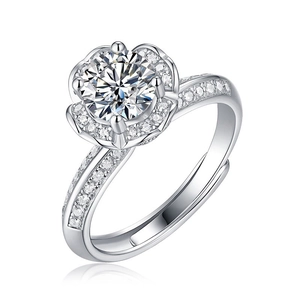 Macro shot of silver flower ring with halo moissanite and adjustable open band