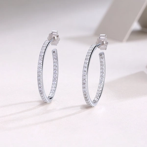 Classic S925 sterling silver hoop earrings with shimmering pave set moissanite stones