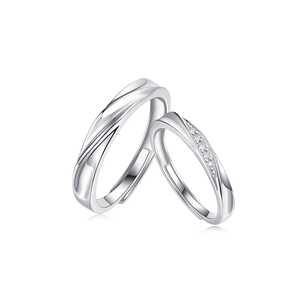 Detailed view of adjustable S925 sterling silver couple rings with polished wave design