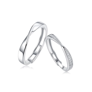Detail view of S925 sterling silver Mobius couple rings with polished finish and zircons