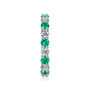 Detailed close-up of S925 silver ring featuring alternating emerald green and white gemstones
